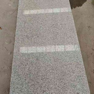 玉林芝麻白光面毛板